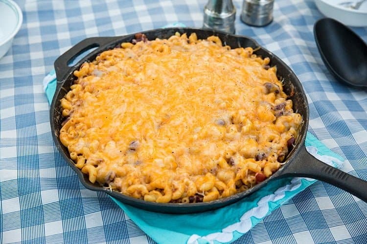 Campfire Cheater Chili Mac Skillet with a blue tablecloth underneath