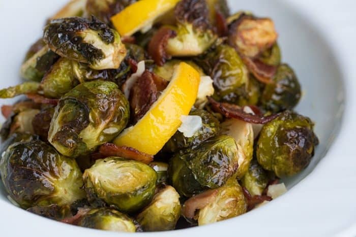 Crispy Lemon Bacon Roasted Brussels Sprouts in white bowl