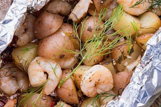 close up Lemon Garlic Shrimp & Potatoes with Dill in Foil Packets