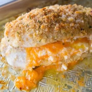 close up of Lemon Garlic Double Cheese Stuffed Chicken in baking sheet