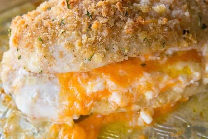 close up of Lemon Garlic Double Cheese Stuffed Chicken in baking sheet