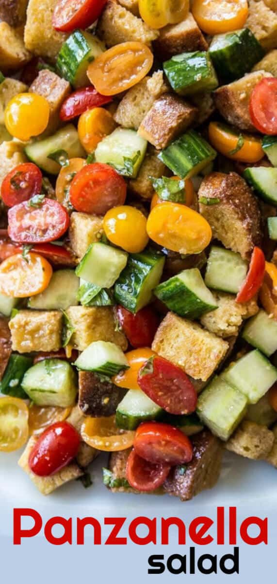 Summer Tomatoes Panzanella Salad. This rustic Italian bread salad is a perfect dish to load up with vegetables. #salad #tomatoes #cucumbers #italian