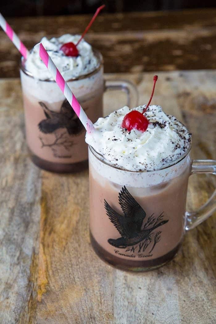Spiked Chocolate Iced Coffee with Caotina and Kahlua with whipped cream and cherry