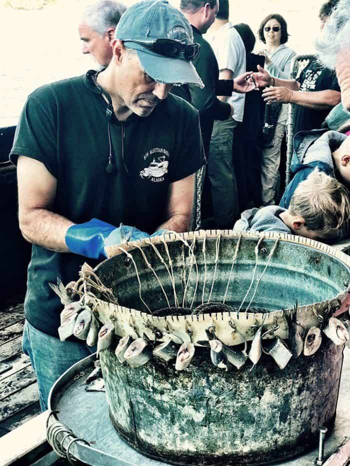 a crew preparing a ring of hooks