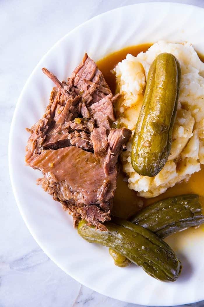 Dill Pickle Pot Roast & Pickle Gravy in white plate