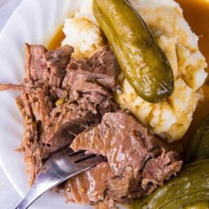 Dill Pickle Pot Roast & Pickle Gravy in white plate