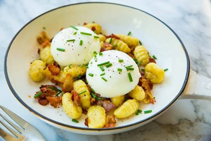 pre-made Gnocchi with bacon, green onions and top with eggs for breakfast