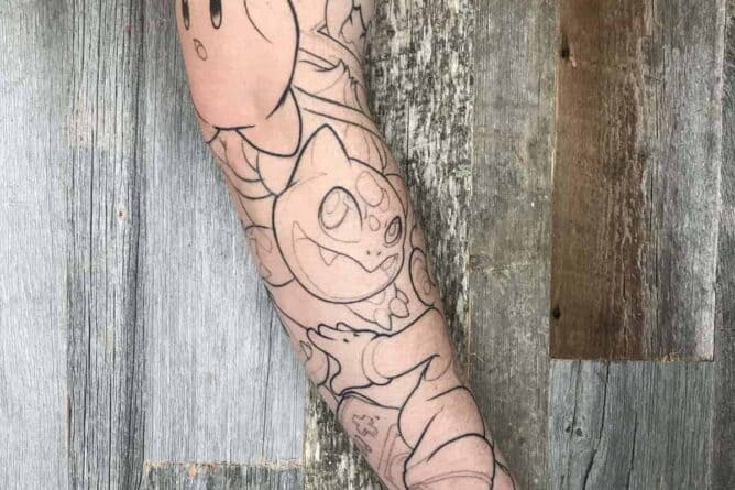 An Arm with full Sleeve Tattoo of Nintendo characters