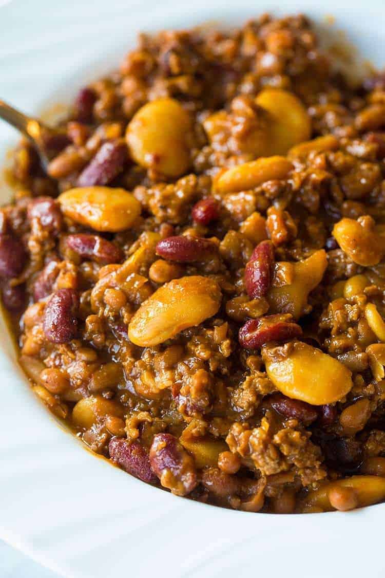 close up of Slow Cooker Calico Beans in a white bowl