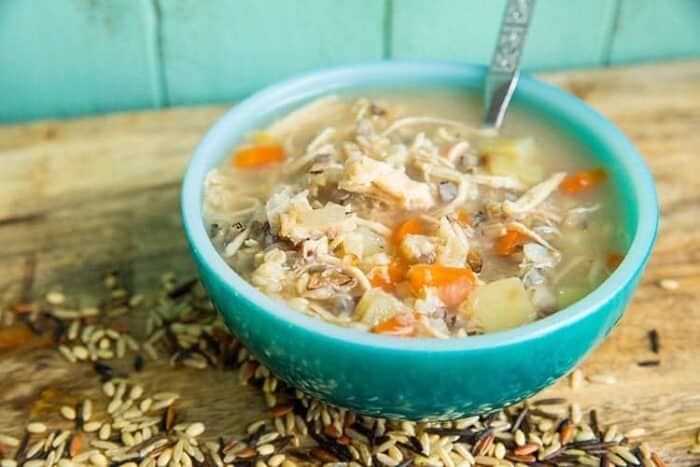 a bowl of Chicken & Wild Rice Soup with a spoon