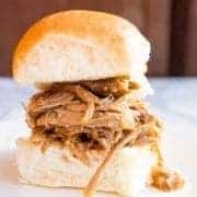 close up Slow Cooker Pulled Pork on toasted buns
