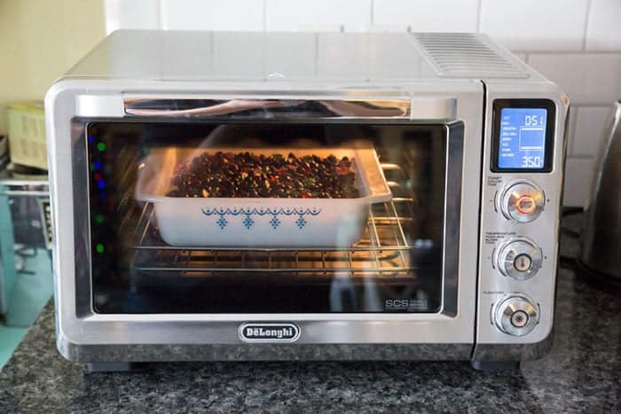 Christmas Magic Bars in a baking dish inside the De'Longhi Livenza Convection Oven