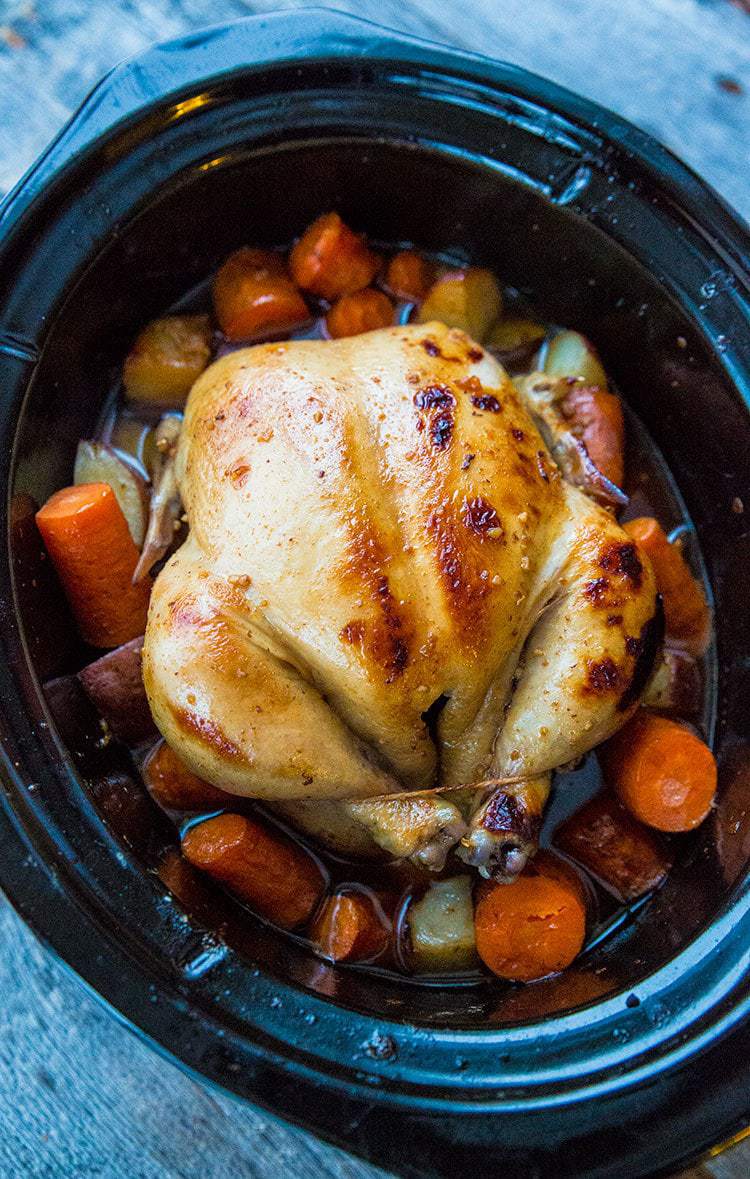 Slow Cooker Whole Chicken with Garlic + Herbs - Ella Claire & Co.