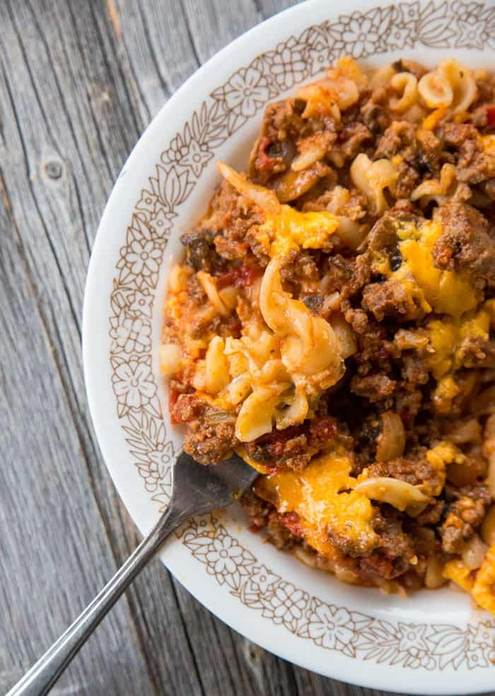 Ground Beef Casserole in a white plate with floral prints