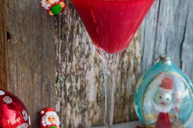 Santa Baby Cocktail with Santa and candy cane decoration
