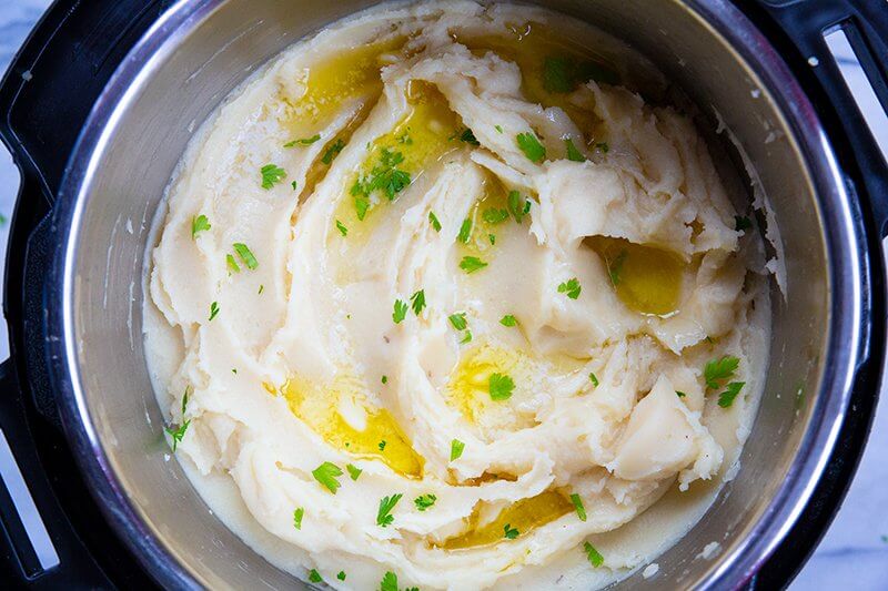 top down shot of Instant Pot Mashed Potatoes with parsley
