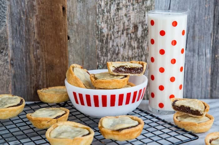 a bowl of Mincemeat Tarts with Butter Pastry and a glass of milk