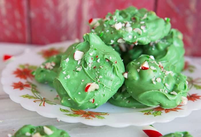Minty Grinch Crock Pot Candy in a white plate