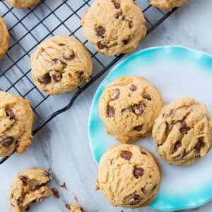 Top down shot of Chocolate chip cookies on black cooling rack and on plate