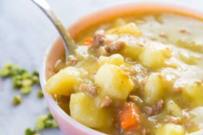 Close up of Creamy Split Pea Hamburger Soup in the slow cooker