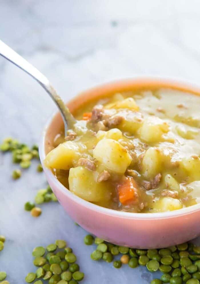 Close up of Creamy Split Pea Hamburger Soup in the slow cooker