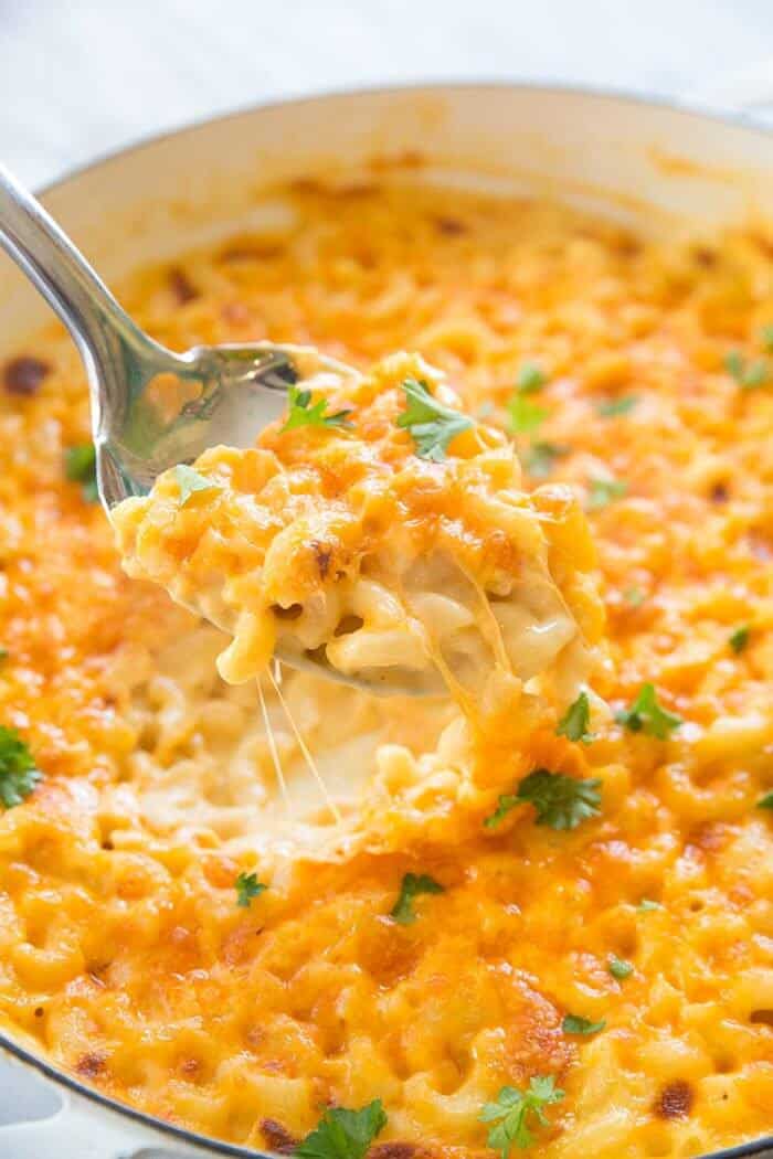 a spoon of Creamy Three Cheese Skillet Mac and Cheese