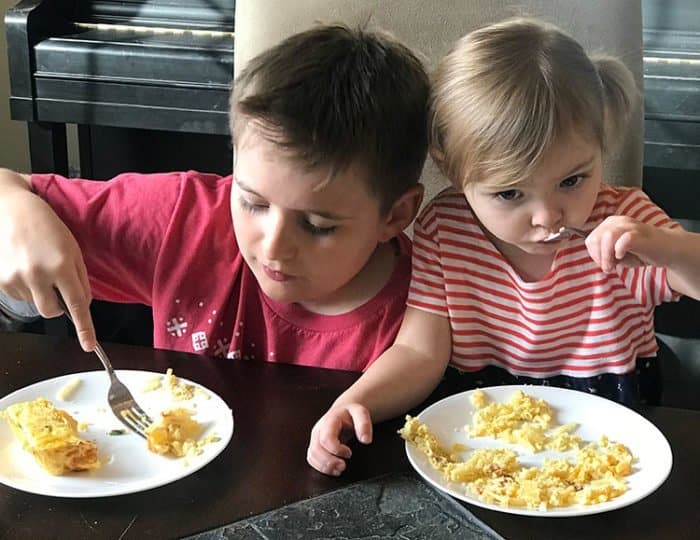 kids enjoying the Hash Brown Casseroles in their plates