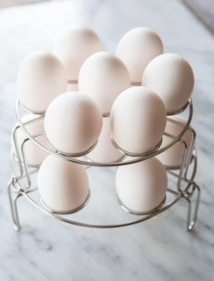 2 stack of egg racks with eggs