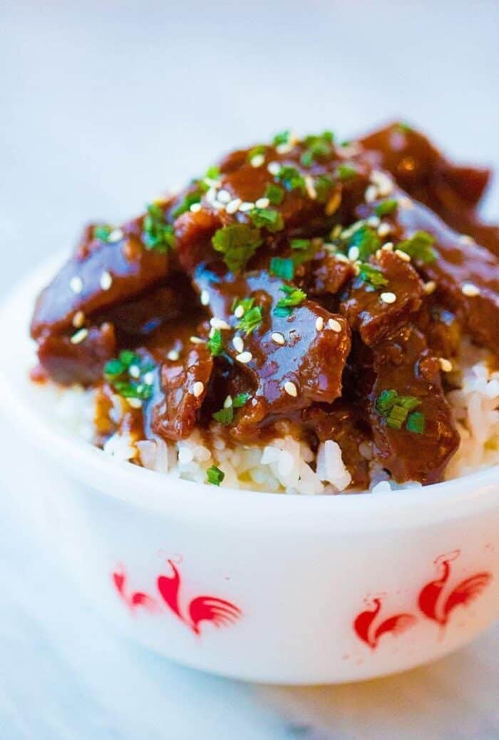 Instant Pot Mongolian Beef in a bowl over rice