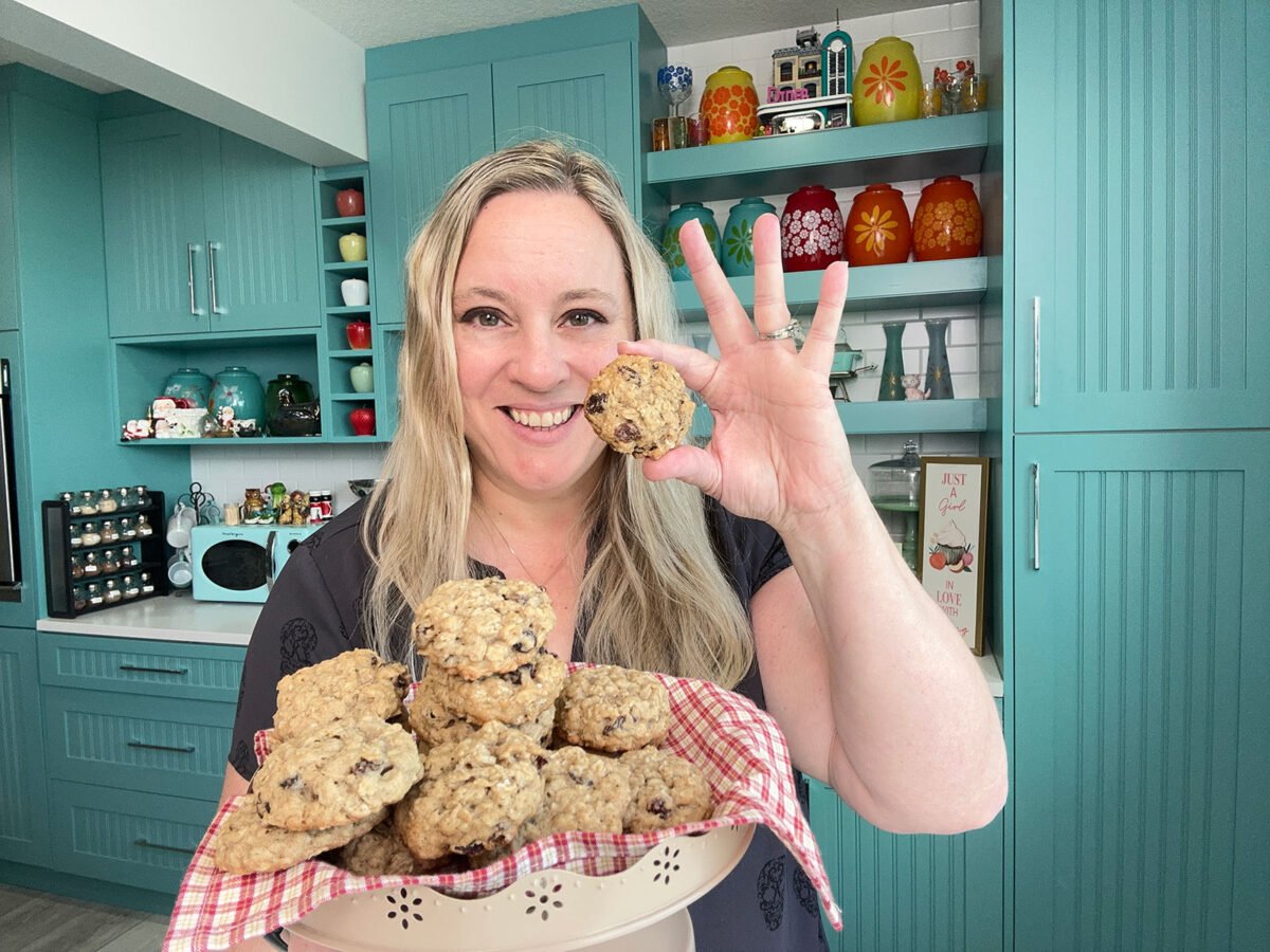 karlynn holding up a vanishing oatmeal cookie