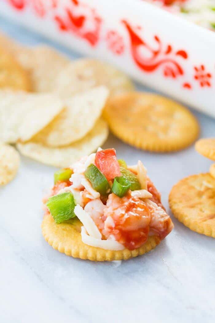 Close up of a cracker with Shrimp Surprise Spread