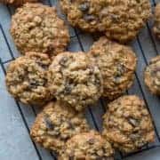 Close up of Quaker Vanishing Oatmeal Raisin Cookies in Black Cooling Rack