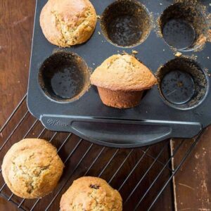 Baked Six Week Raisin Bran Refrigerator Muffins in Muffin Tins and Cooling Rack