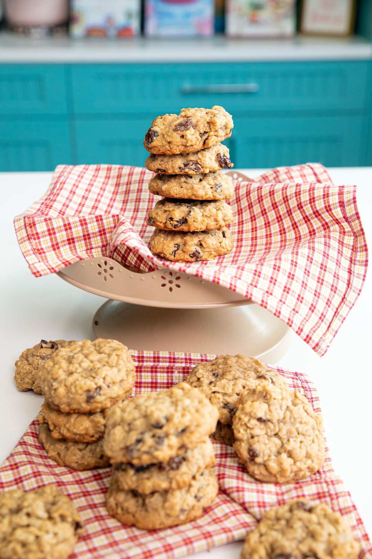 stack of vanishing oatmeal cookies on a red and white napkin in the kitchen. 