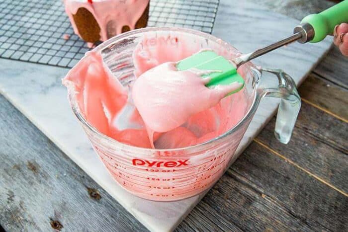 Cherry Icing Glaze in a Pyrex measuring cup