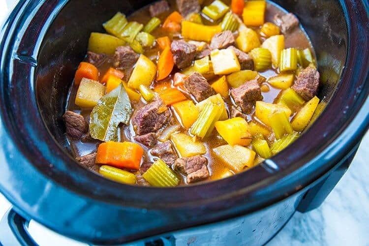 Simple and Delicious Beef Stew on a black Crock Pot