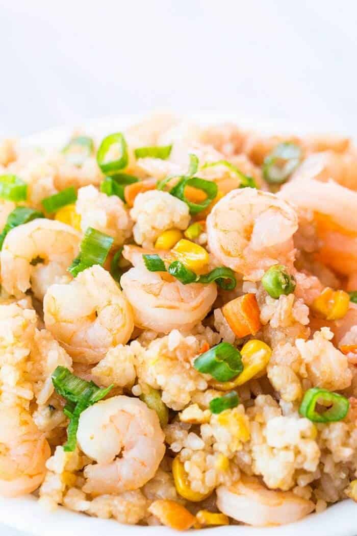 close up of Shrimp Fried Rice topped with chopped green onions