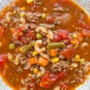 Top down shot of Hamburger Soup with Elbow Macaroni and Vegetables in a Soup Bowl