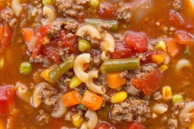 Top down shot of Hamburger Soup with Elbow Macaroni and Vegetables in a Soup Bowl