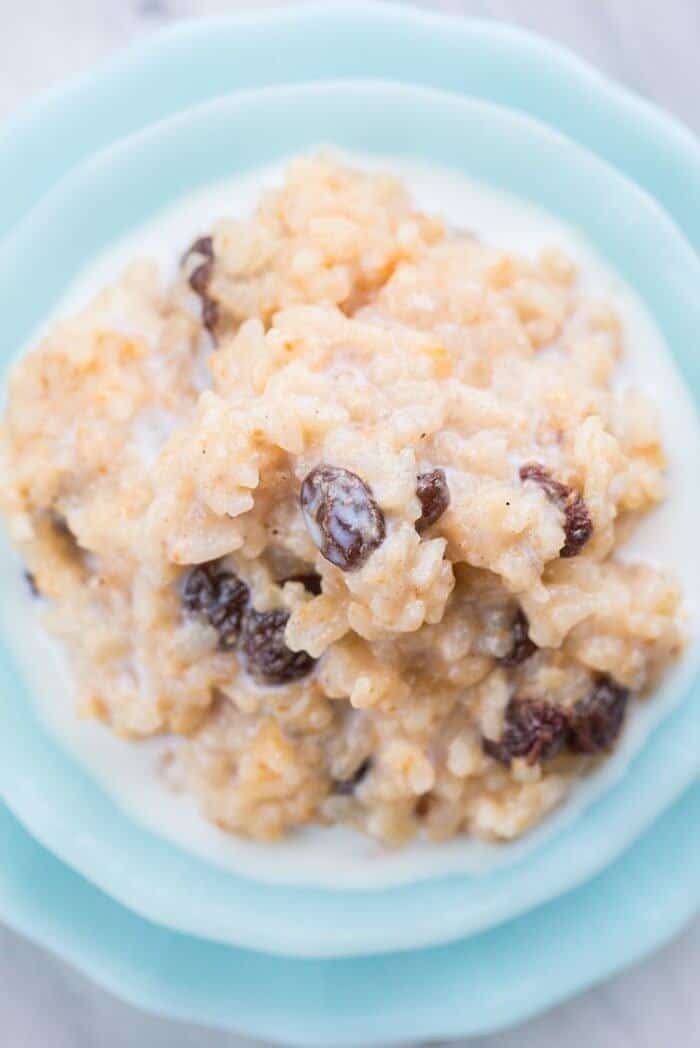 Top down shot of Instant Pot Rice Pudding in a Jade blue bowl 