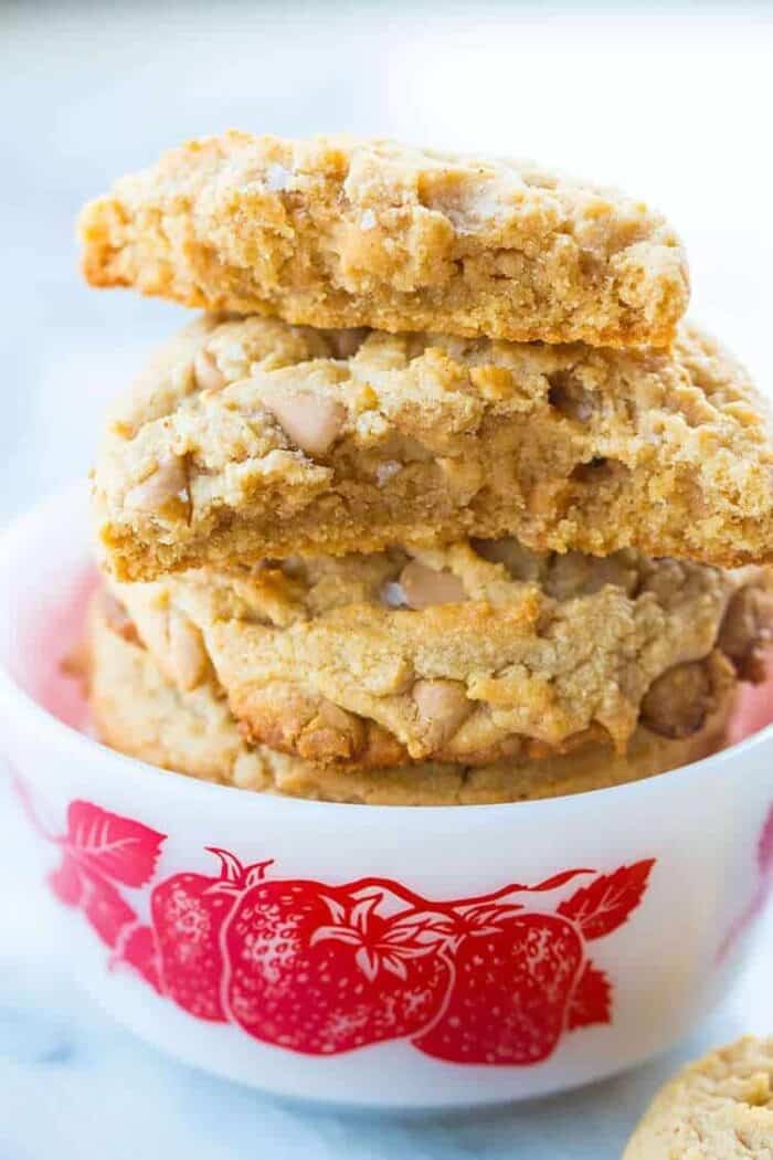 Close up Stack of Chewy Peanut Butter Cookies in a white Bowl with strawberry print