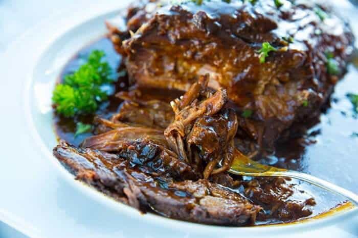 Root Beer BBQ Slow Cooker Brisket in a white plate