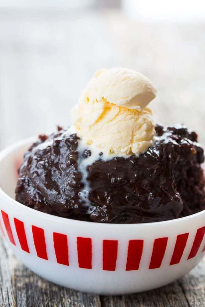 Close up of Chocolate Slow Cooker Lava Cake in a Bowl Topped with vanilla ice cream