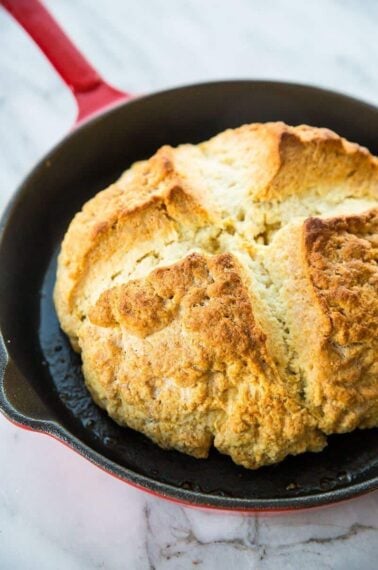 Close up of Irish Soda Bread in Large Red Skillet