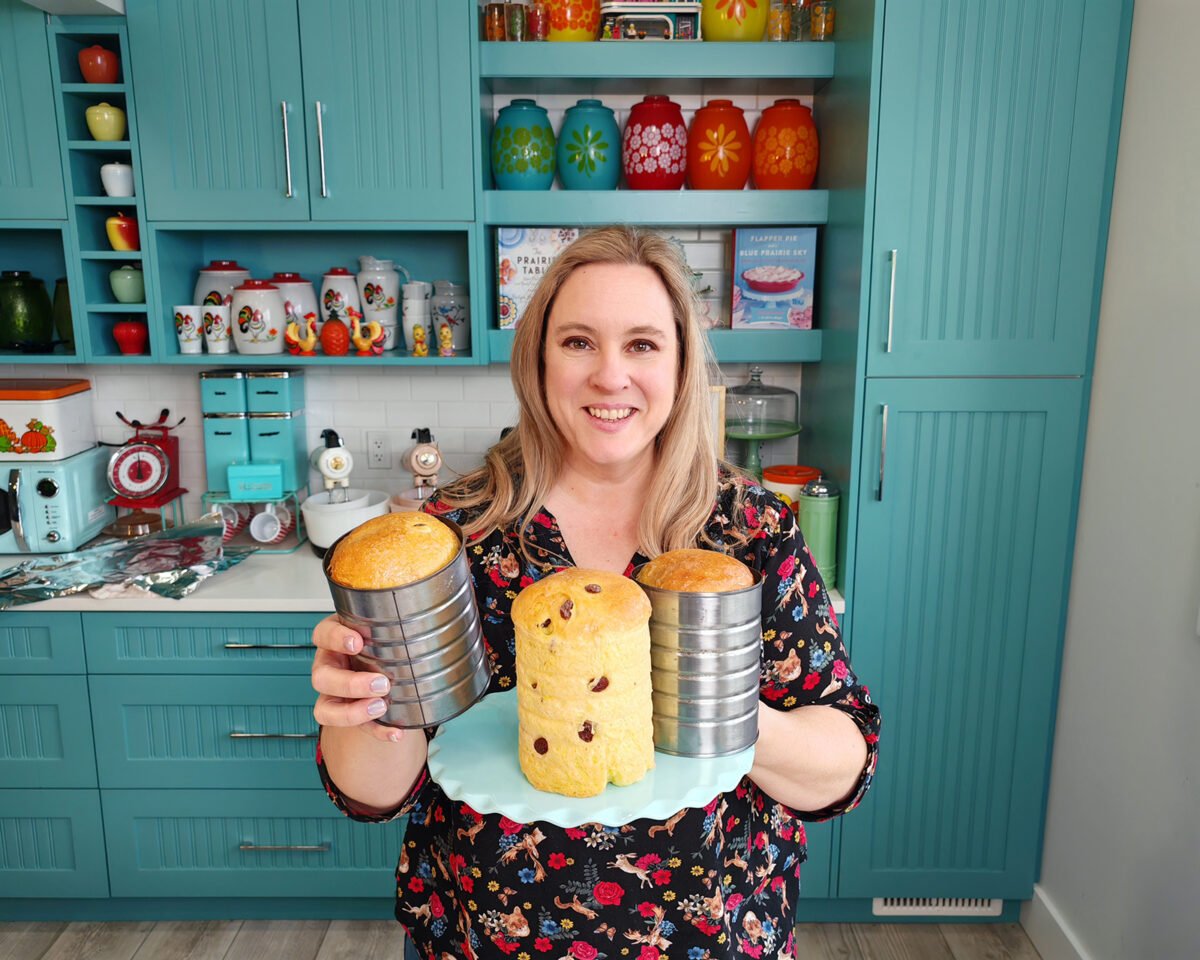 Karlynn holding loaves of her Ukrainian Babka (Easter bread)