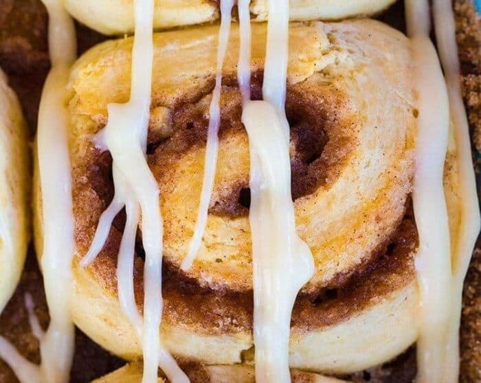 Pastry and Cinnamon Roll Icing Glaze or Frosting on top of Cinnamon Roll
