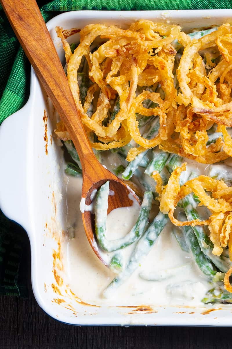 close up Asparagus and Green Bean in Casserole with wooden spoon