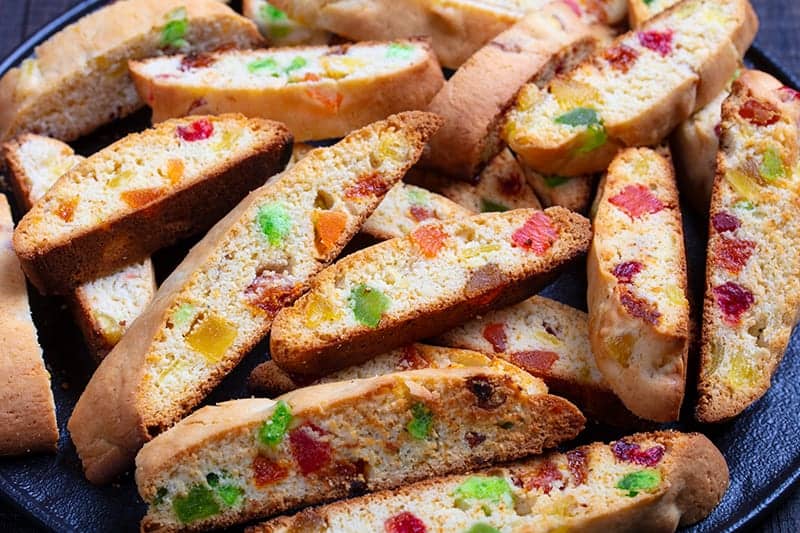 slices of toasted Christmas Biscotti on a large black serving plate