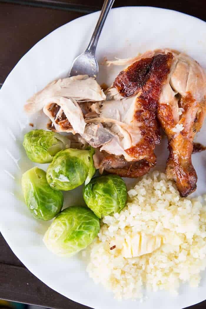 Carved up rotisserie chicken with Brussels sprouts & riced cauliflower