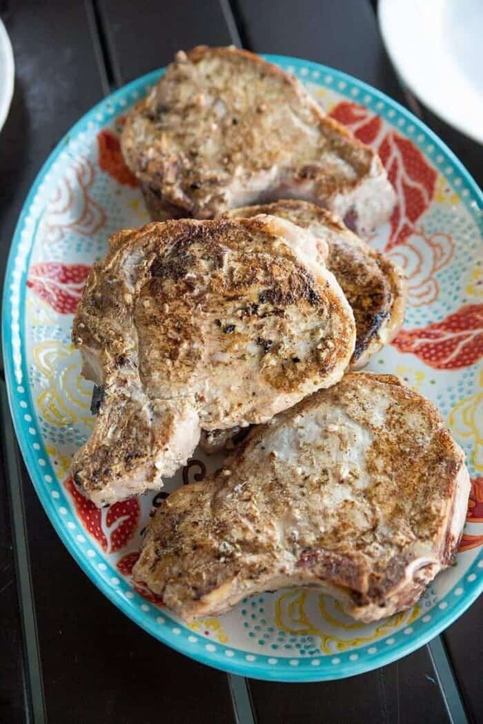 close up of Lemon Herb Grilled thick cut pork chops
